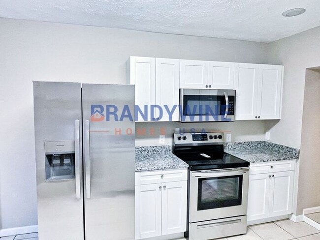 Building Photo - Happy New Year! Move in by 2/15 and get Ma...