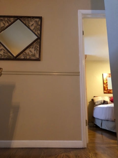 Hallway with door to private suite - 819 Rubis Dr