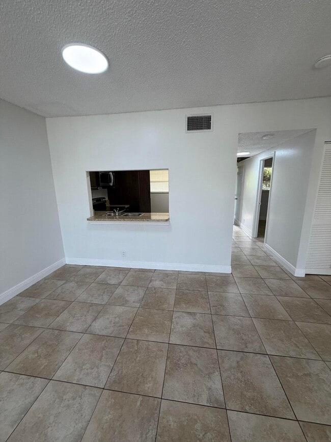 Building Photo - 2500 Coral Springs Dr