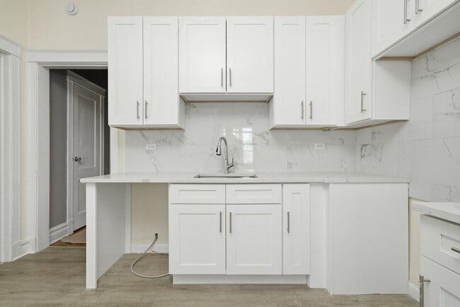 Building Photo - 7442 S Langley Ave