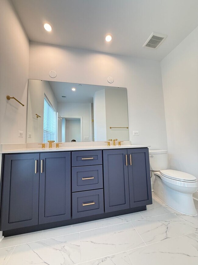 Building Photo - Brand new 4 level, 4 Bedroom Townhome with Elevator!