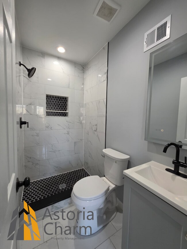 Building Photo - Renovated 2 Bedroom + Den, 3 Bath Home with Ensuites, Finished Basement and Stainless Appliances
