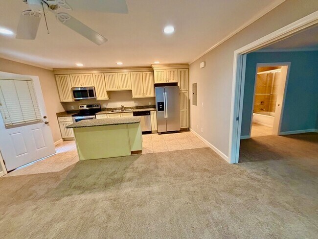Building Photo - Top-Floor South End Villa Near Coligny Beach- Available Now!