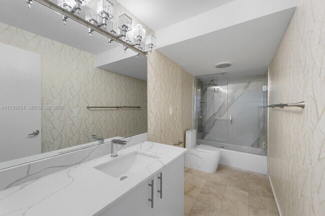 Building Photo - 10275 Collins Ave
