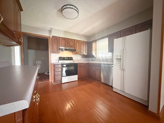 Building Photo - Spacious 3-Bedroom Home with Huge Yard, Covered Porches & Storage Building