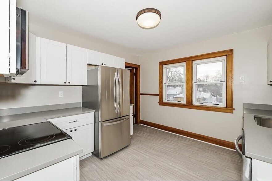 Updated Kitchen (Back door entracne pictured to right of fridge) - 2209 E 33rd St