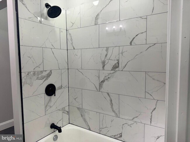 Building Photo - 2128 W 65th Ave