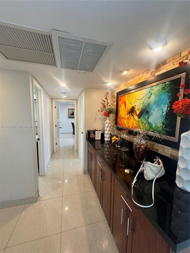 Building Photo - 19370 Collins Ave