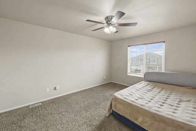 Building Photo - Spacious 4-Bedroom Home with Loft, Solar & Fenced Backyard