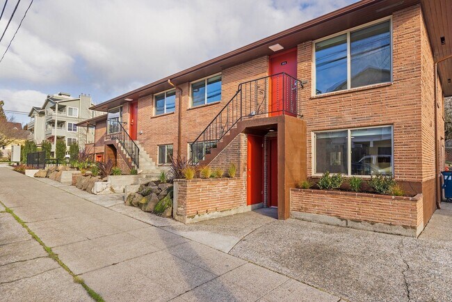 Building Photo - Ballard Gem! Updated Apartment w/ Parking, Bright Interiors & Steps to Dining + Parks