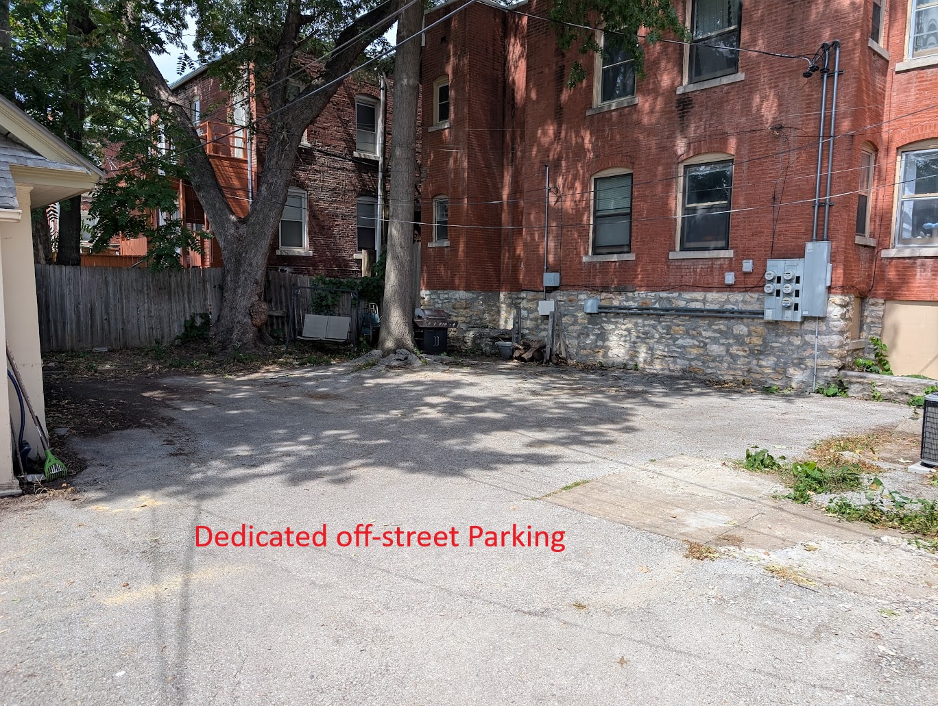 Dedicated off-street parking spot behind house - 3404 Baltimore Ave