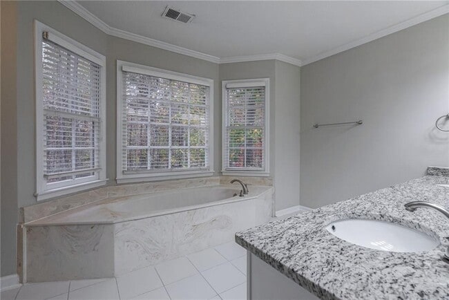 Building Photo - 8895 Club River Dr