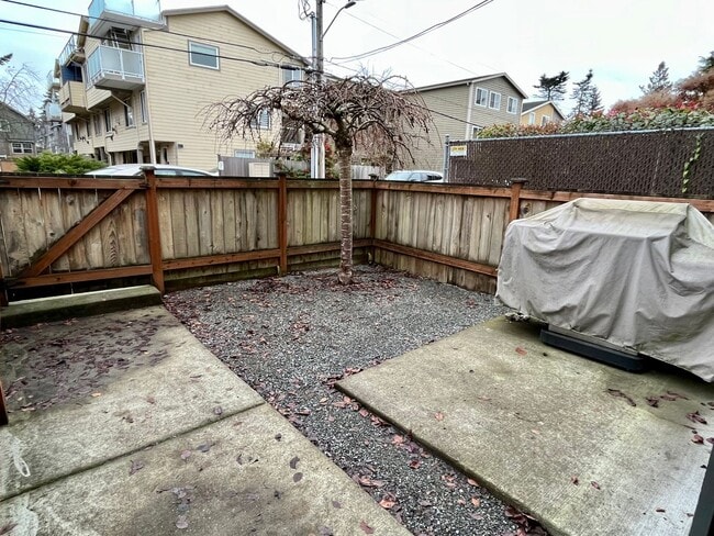 Building Photo - Stylish Greenwood Townhome with Private Patio & Modern Finishes