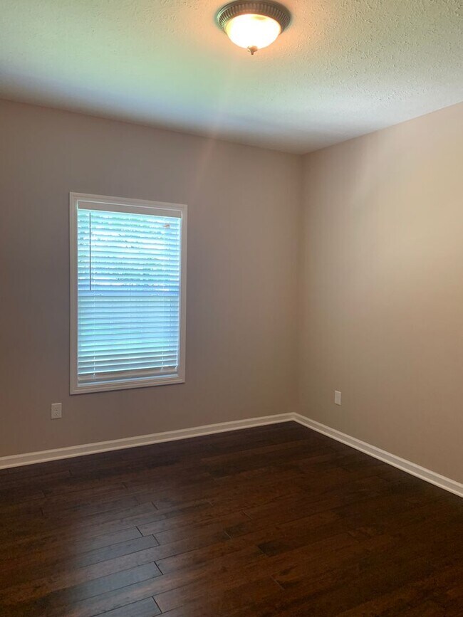 Building Photo - Modern comfort and privacy in the heart of...