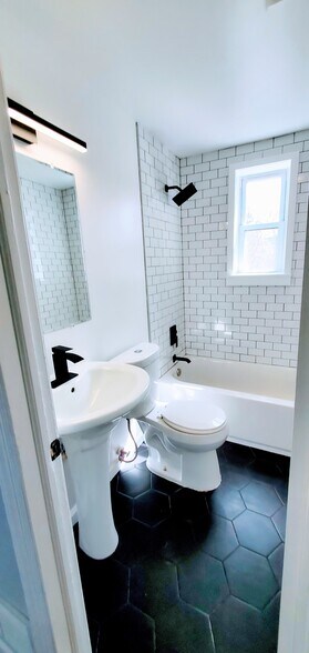 Full bath (top floor). Chic designer tile! - 4223 Gault Pl NE