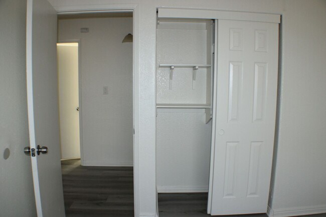 Building Photo - Move-In Ready 4BR/2BA with New Flooring, F...