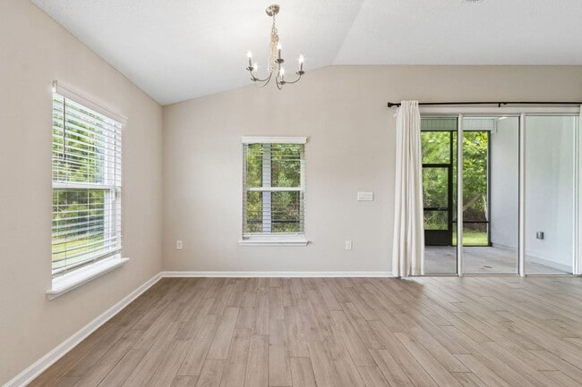 Building Photo - Modern 4BR Home with 3 Full Baths in River Glen | Screened Porch & Resort-Style Amenities