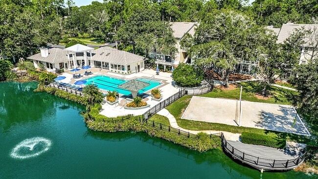 Resort Style Pool  and Sand Volleyball Overlooking Lake - The Waterford at Mandarin Apartments