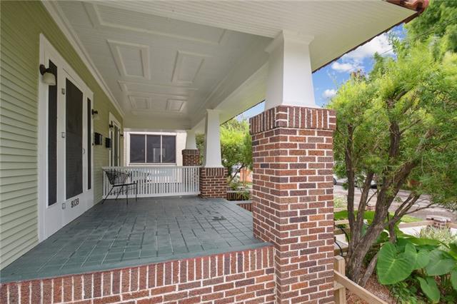 Shady front porch on a tree-lined street - 8139 Cohn St