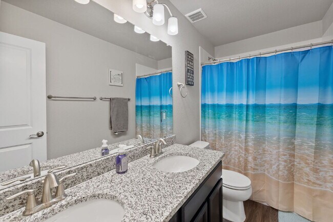 Building Photo - Beautiful 4-Bedroom Home on Blue Lunar Lan...