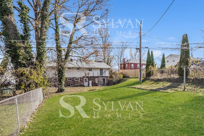Building Photo - Enjoy living the good life in this 4 bedro...