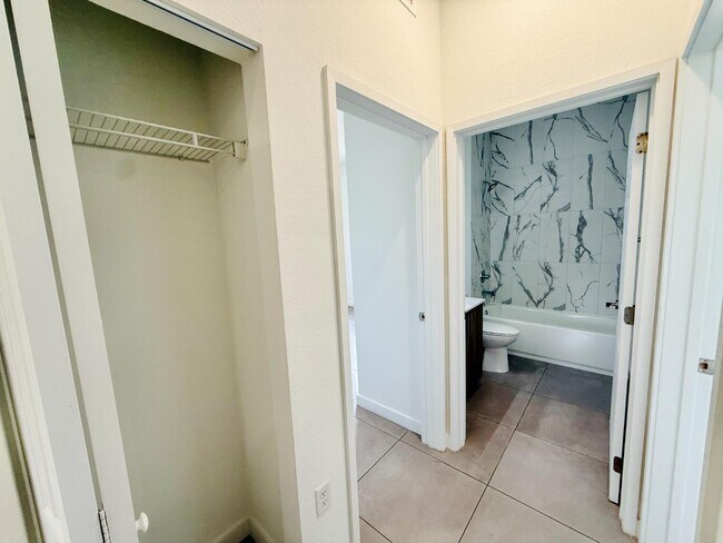 Building Photo - 1295 W 69th St