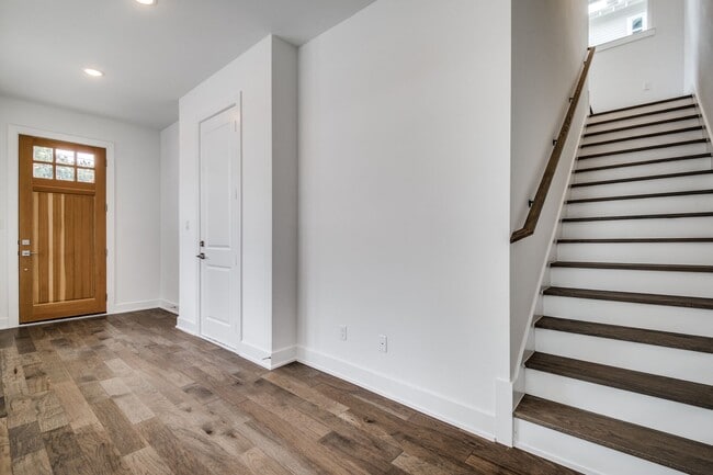 Building Photo - Welcome to a beautiful Craftsman-style Tow...