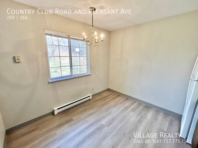 Building Photo - 605 Country Club Rd