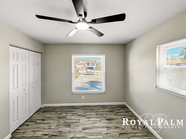 Building Photo - Tree-Lined 2BR/1BA Fort Myers Duplex with Fenced Yard, Storage Shed & In-Unit Laundry!
