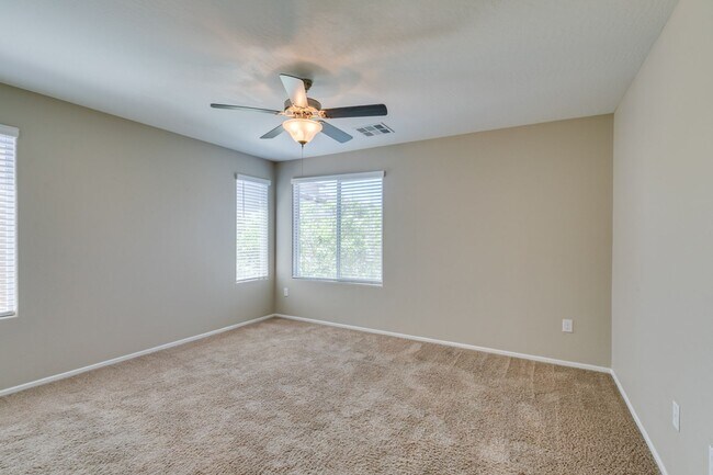 Building Photo - Spacious Townhouse with Loft & Rare 3-Car Garage!