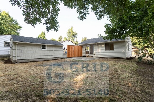 Building Photo - Charming 2BR House with Garage & Private Patio in Vancouver!