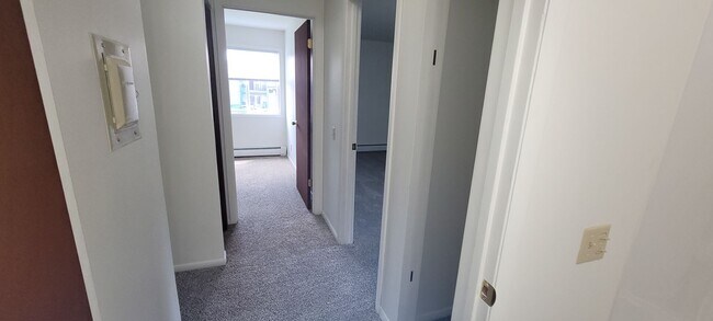 Building Photo - Upper 2 Bedroom Apartment – Heat Included - Available: First Week of July  2026