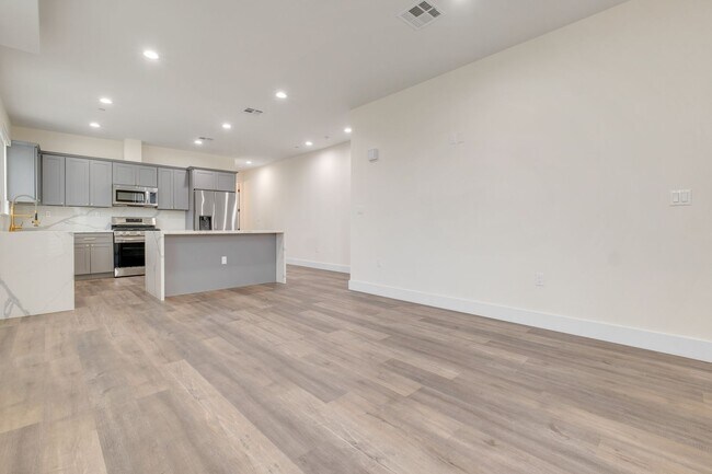 Building Photo - A beautifully designed and renovated 4 bed...