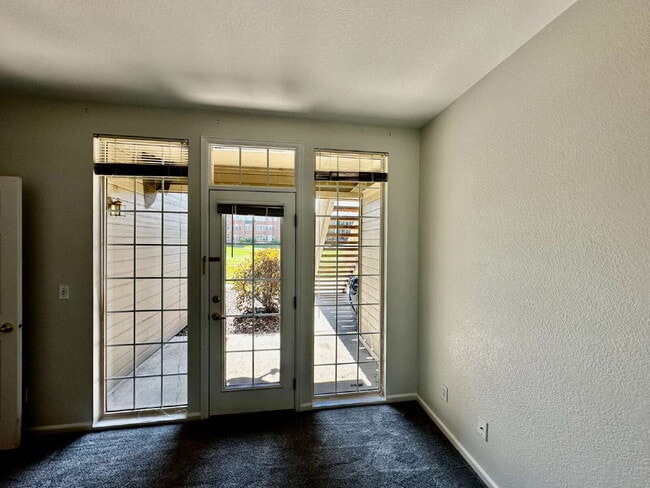 Building Photo - "Spacious 2-Bed, 2-Bath Condo with Pool Ac...
