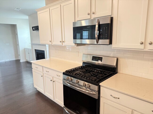 Building Photo - Beautiful Westbranch Home with 2-Car Garage, Covered Porch & Greenway Entrance Across the Street