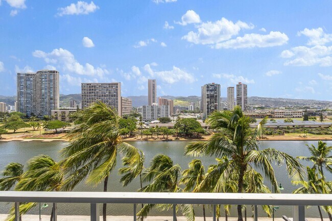 Building Photo - Waikiki 1BR/1BA with Ala Wai Canal & Mountain Views — Wraparound Lanai, Utilities Included