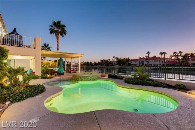 Building Photo - Vegas's Only Available Waterfront Rental ~ 4 Bedroom Desert Shores Lake Front Home