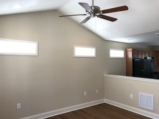 Vaulted family room with plenty of transoms to light up your space - 2312-A Belle Ave NE