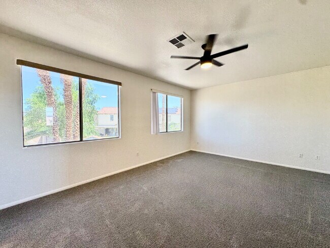Building Photo - Spacious 4BD/3BA NLV Home with Downstairs ...