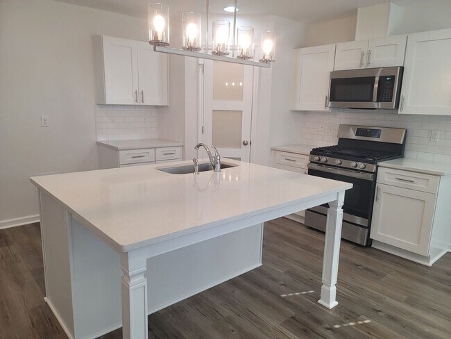 Building Photo - NEWER CONSTRUCTION! Modern NE 3/2.5 w/ Stainless Steel Appliances, Granite Counters, Washer, Drye...