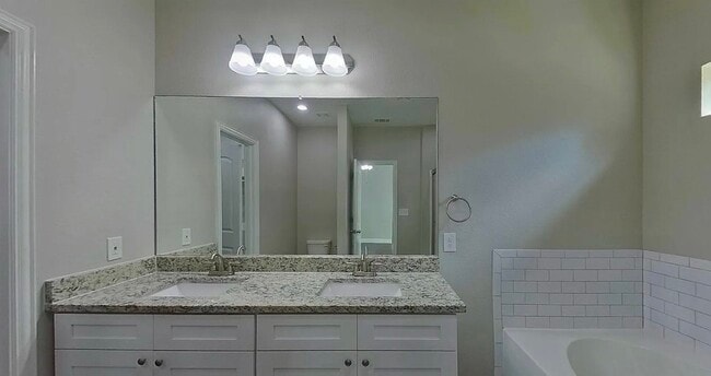 Building Photo - Move-In Ready 4-Bedroom Home with Timeless Appeal