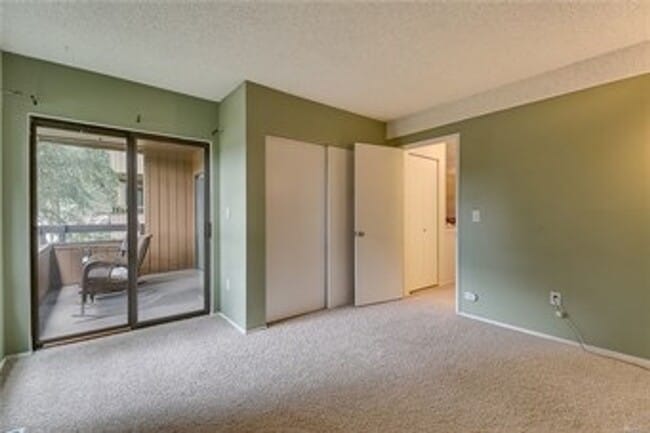 Building Photo - Freshly Updated 3BR Condo w/ Cozy Fireplace, Deck & 2 Parking