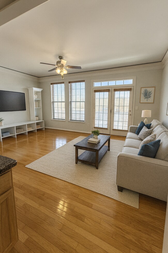 one of two spacious living areas on main level, right off the kitchen, walk out to deck - 1518 montessori terrace