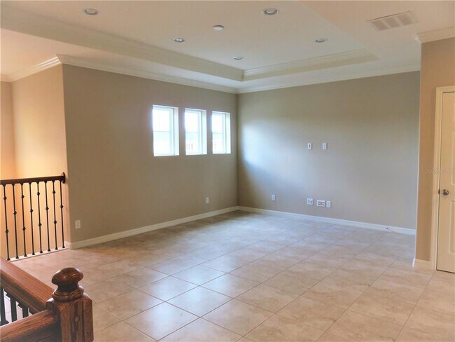 Building Photo - 8828 Tropical Palm Dr