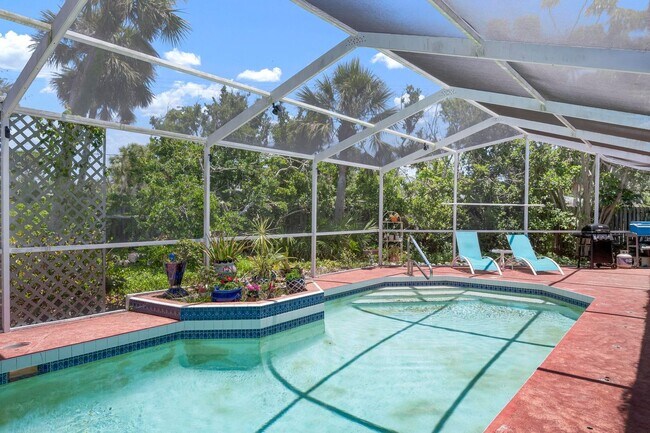 Building Photo - ** STUNNING 4 BEDROOM 2 FULL BATH/ 2 HALF BATH HOME WITH A PRIVATE POOL LOCATED JUST MINUTES FROM...