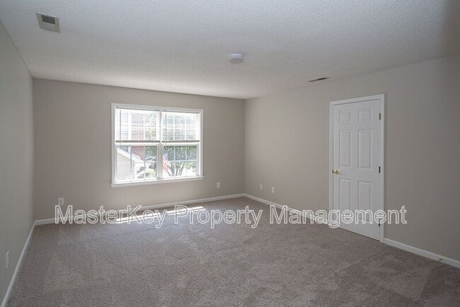 Building Photo - 7916 Strawberry Meadows St