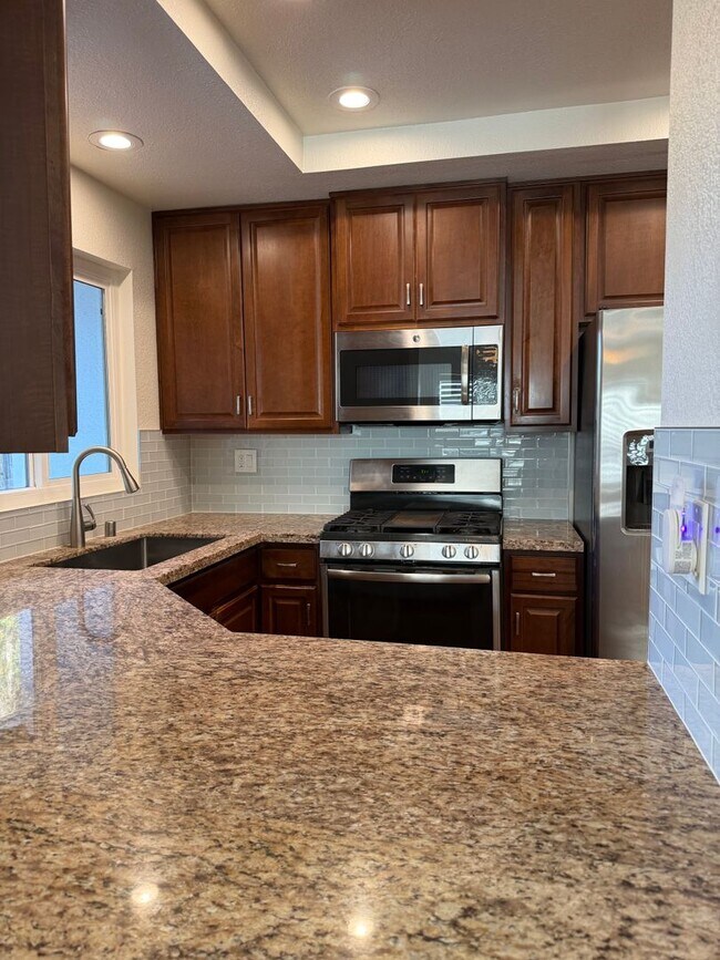 Building Photo - Very Private Carriage Unit Available Now!