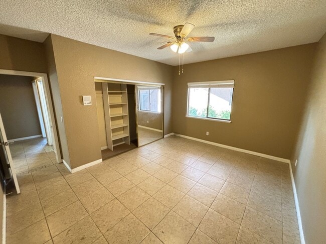 Building Photo - Stunning 3Bed/2Bath/2Car 1st Floor Condo with Private Yard, and Luxurious Amenities!