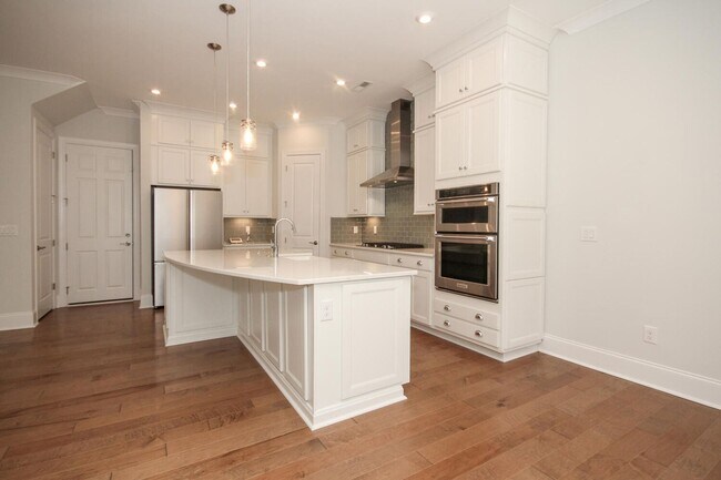 Building Photo - Beautiful John Wieland end unit townhouse ...