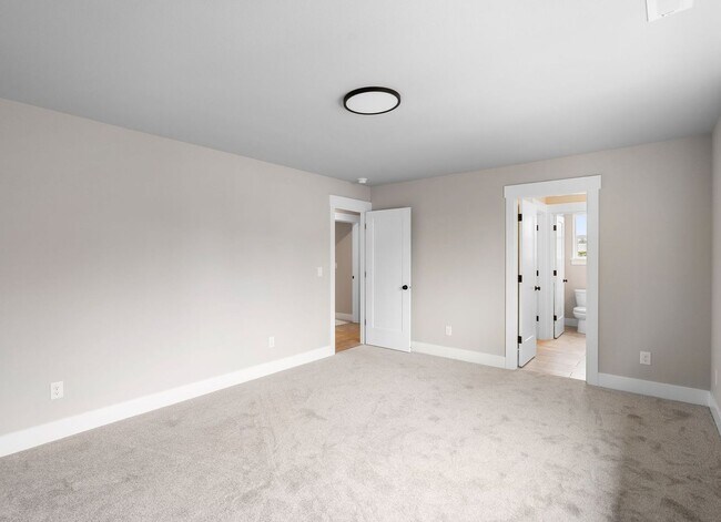Building Photo - Beautiful New Construction 4-Bedroom Home with a Main-Level Bedroom, Designer Finishes, Attached ...